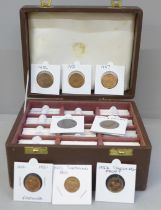 Over 120 high grade copper coins in holders and a case