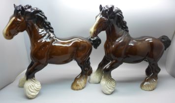 Two Beswick cantering shire horses
