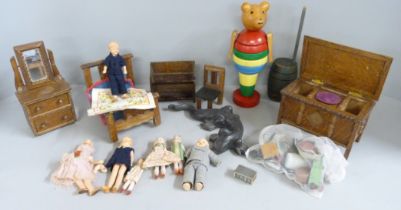 A collection of small dolls, dolls house furniture, a Swedish Brio wooden Teddy bear toy, a heavy