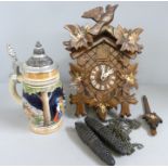 A hand painted German stein and a cuckoo clock **PLEASE NOTE THIS LOT IS NOT ELIGIBLE FOR POSTING