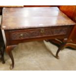 A George II carved oak single drawer side table