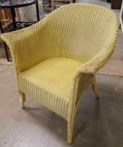 A Lloyd Loom yellow wicker chair