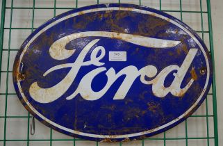 A Ford enamel advertising sign