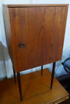 A teak bedside cabinet