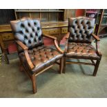 A pair of mahogany and chestnut brown leather Gainsborough style chairs