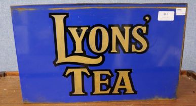 A double sided Lyons Tea sign