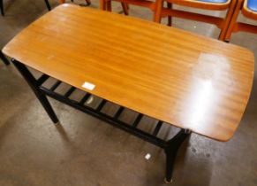 A Nathan walnut and black coffee table