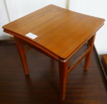 A small teak occasional table