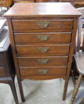 An Edward VII walnut music cabinet