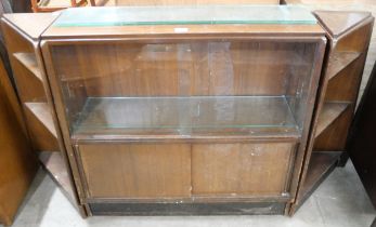 A tola wood display cabinet and two corner units