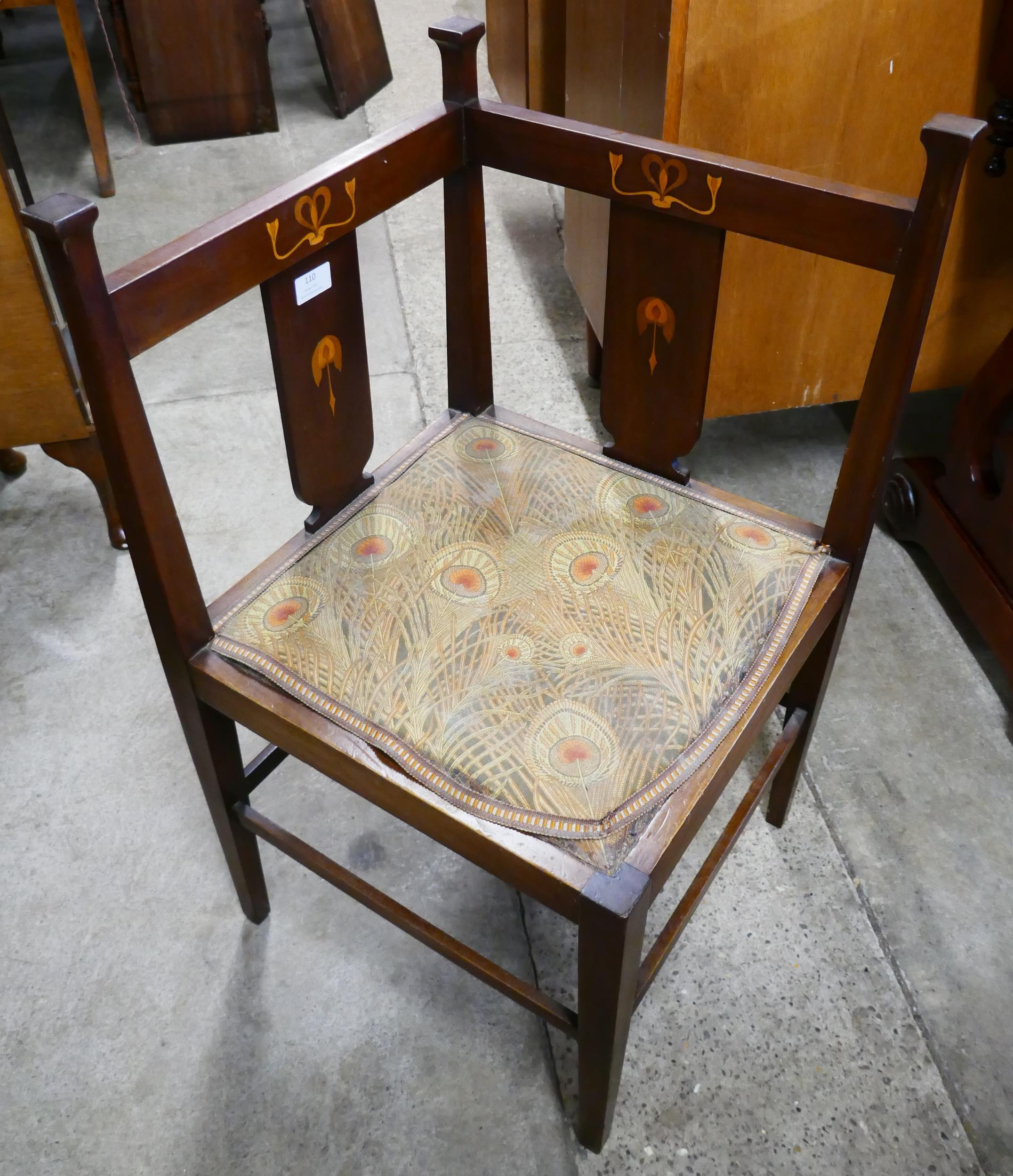An Arts and Crafts inlaid corner chair