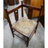 An Arts and Crafts inlaid corner chair