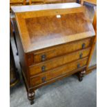 A Queen Anne style oak and burr walnut bureau