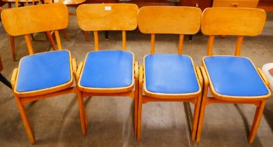 A set of four West German Centa beech stacking chairs