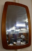 A teak framed mirror