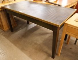 An industrial metal factory table