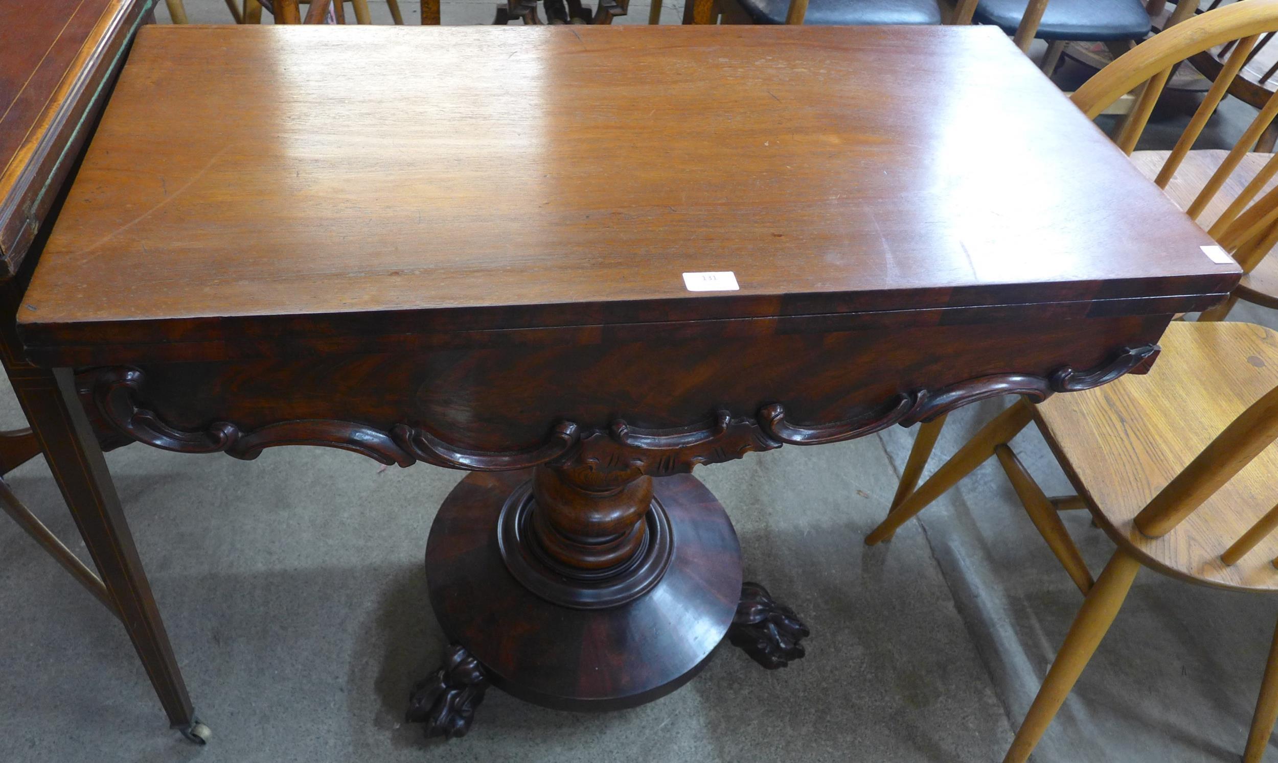 A George IV mahogany rectangular fold over tea table