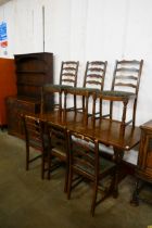 An oak eight piece dining suite, comprising; refectory table, six chairs, dresser and a pot cupboard