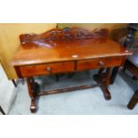 A Victorian style hardwood two drawer wash stand