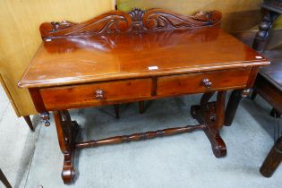 A Victorian style hardwood two drawer wash stand