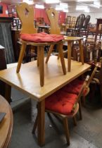 An ash dining table and four chairs