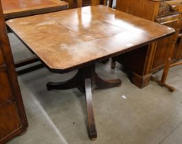 A Victorian oak octagonal breakfast table