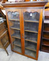 A Victorian oak two door bookcase top