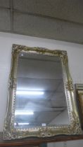 A Victorian style gilt framed mirror