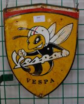 A Vespa advertising sign