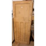 Three stripped pine doors