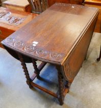 A early 20th Century carved oak barletytwist gateleg table