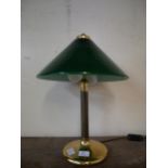 A brass and opaline green glass table lamp