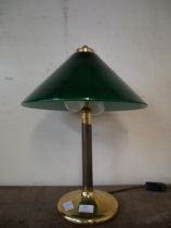 A brass and opaline green glass table lamp