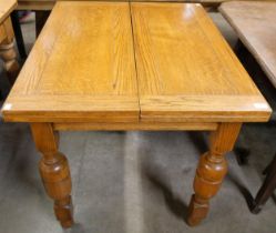 An early 20th Century oak fold out pastry table