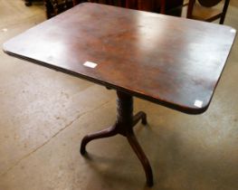 A George III mahogany rectangular tilt top tripod tea table