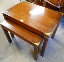 A mahogany and brass mounted campaign style nest of two tables