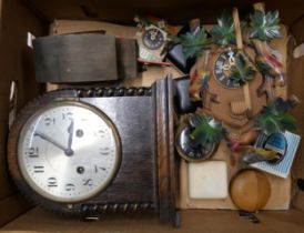 An early 20th Century oak mantel clock, a cuckoo clock, etc.