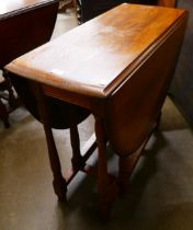 An oak gateleg table