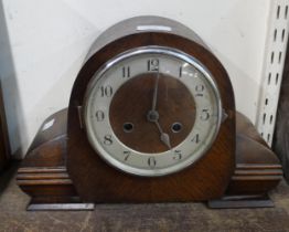 An oak mantel clock