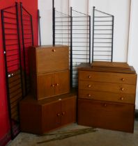 A teak and black metal corner room divider