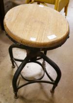 A pine and black metal industrial machinist's stool