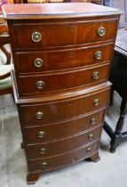 A small George III style mahogany chest on chest