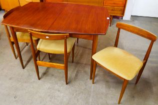 A White & Newton teak extending dining table and four chairs