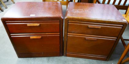 A pair of Hulsta beech bedside cabinets