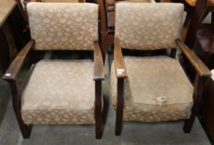 A pair of 1930's beech fireside chairs