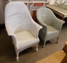 A pair of painted wicker chairs