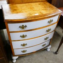 A George III style painted walnut bow front chest of drawers