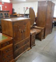 An early 20th Century carved oak three piece bedroom suite