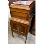 A Columbia oak gramophone on stand, with original manual, etc.