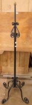 A French wrought iron floor standing lamp